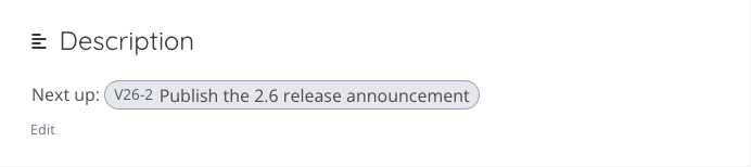 A task description showing another task as a compact pill with its identifier and title